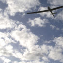 La Ouenghi : Planeur en finale sous altocumulus © Etienne Ged